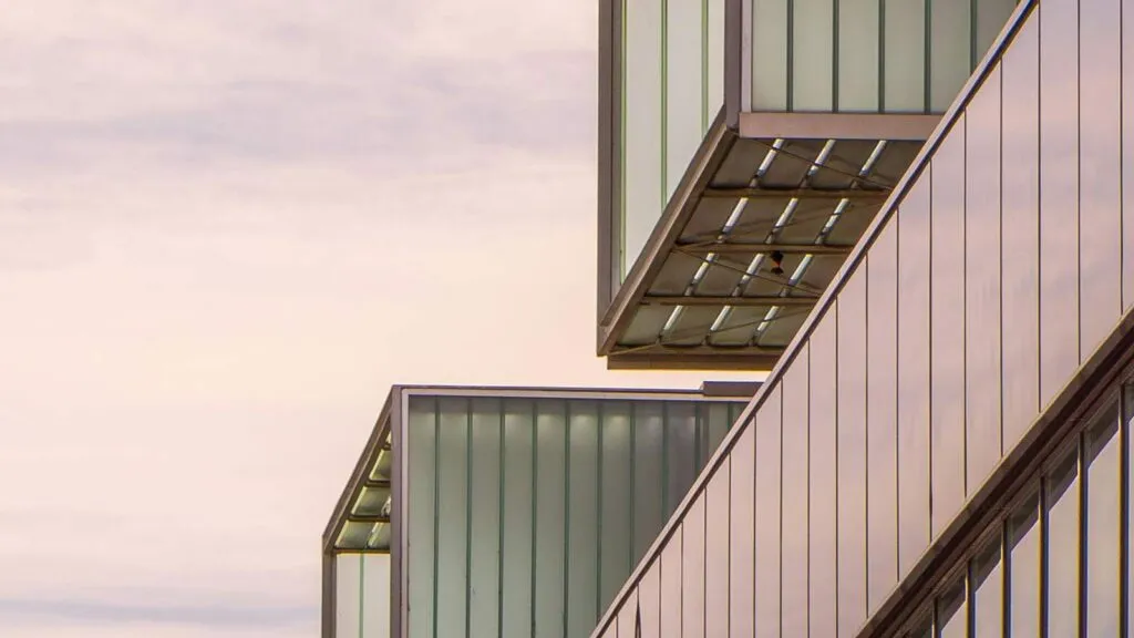 a building with glass walls Lending Industry mortgage ucc search artificial intelligence in real estate local title company title update